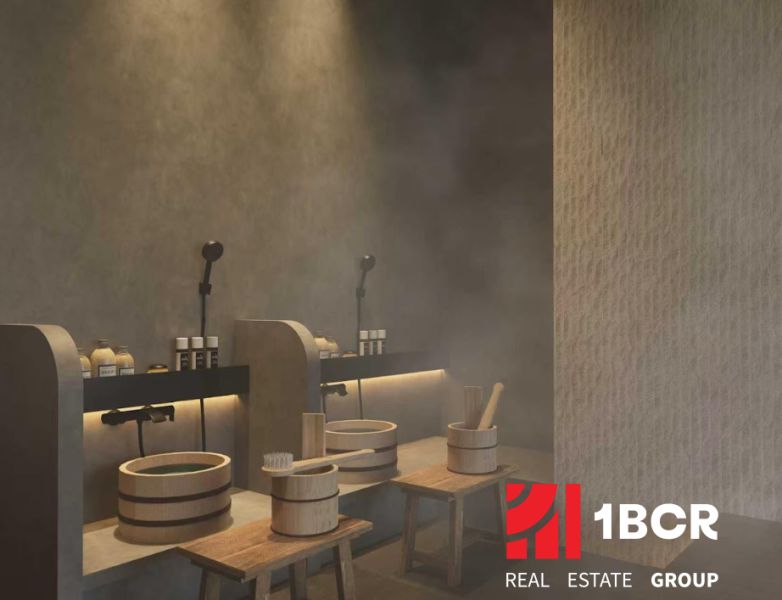 A spa room with wooden containers, benches, and equipment for apartment construction.