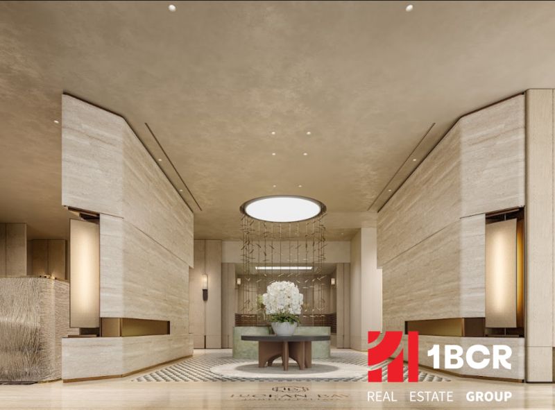 Luxury interior with wood-patterned flooring and modern lighting in the context of apartment construction.