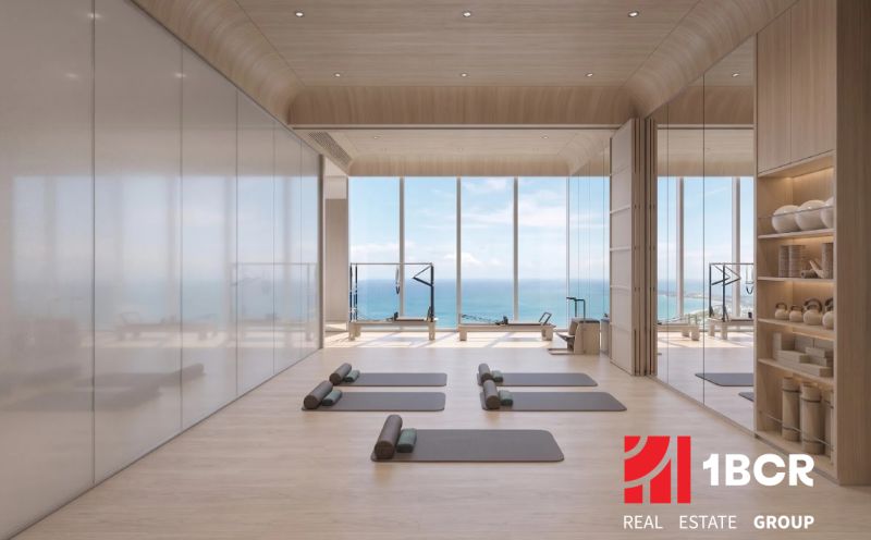 Interior of exercise spaces with a view of the sea, apartment construction.