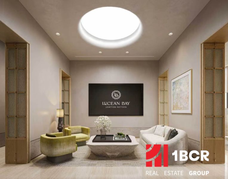 Elegant interior with wood-decor flooring, a sofa, and designer furniture.
