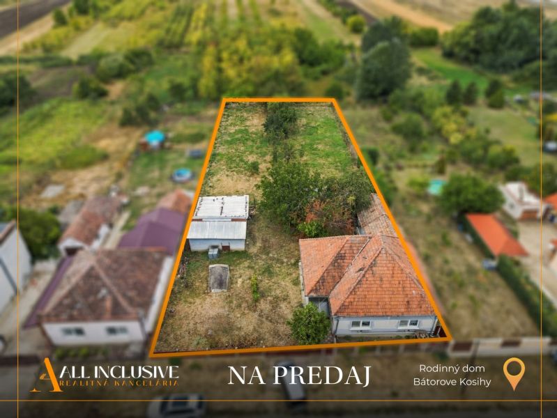 Aerial view of a family house in Bátorove Kosihy with two roof structures.