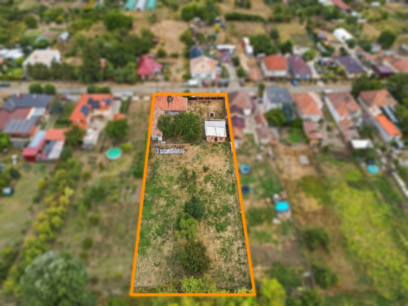 Aerial view of a garden at a family house in Bátorove Kosihy with a grassy area.