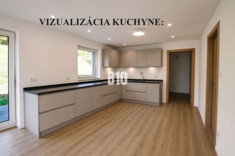 The kitchen of the family house features modern cabinets and a floor with a wooden design.