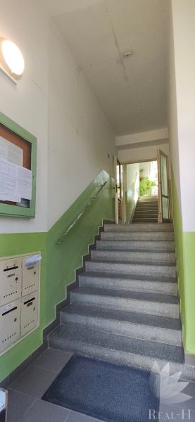The entrance area of the building on Sečovská Street in Bratislava - Ružinov with mailboxes.