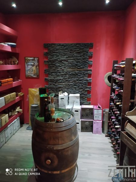 In the basement of the Villa, there is a wine cellar with a wooden barrel and wine racks.