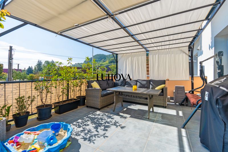 Terrace of a 3-room apartment with seating area and toy pool, Mikušovce, Mikušovce.