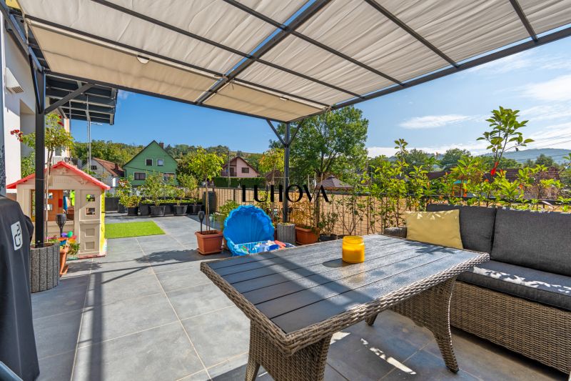 Terrace of a 3-room apartment with a view of the gardens in Mikušovce on Mikušovce Street.