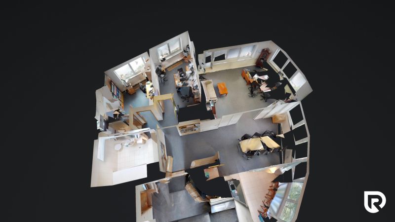 Office interiors with office furniture, computers, and ergonomic chairs.