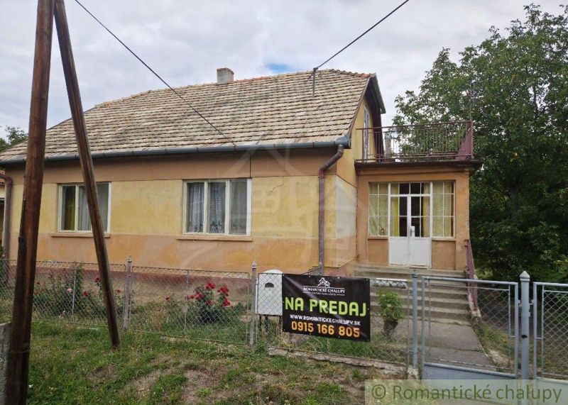 A family house in Sečianky, single-story with a gable roof and a garden. For sale.