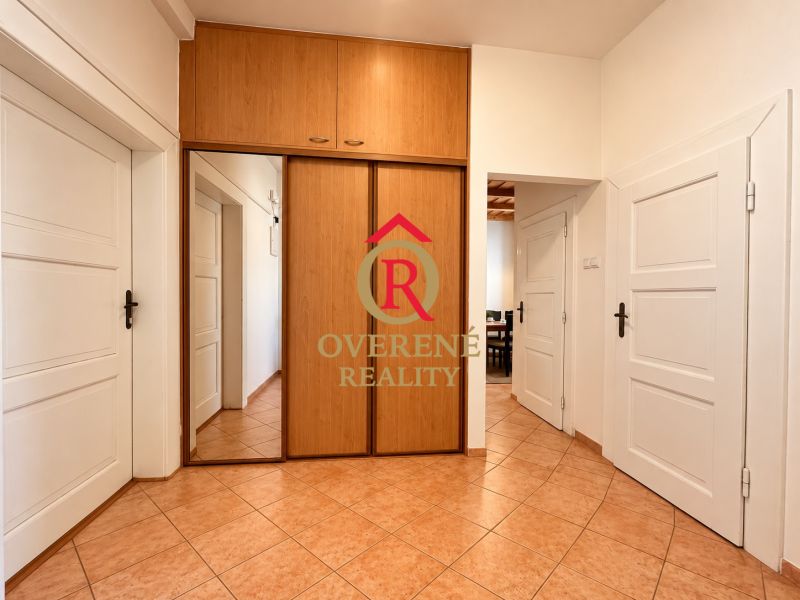 2-room apartment with tiles, a built-in wardrobe, and white doors.