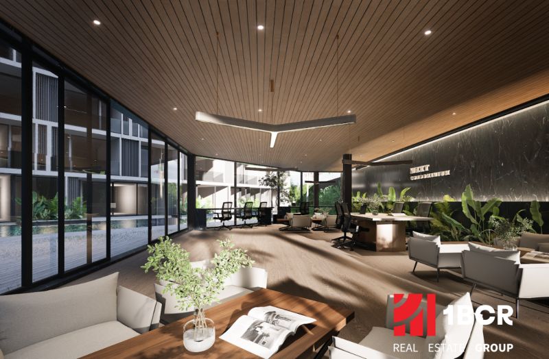 Interior of apartment construction, with wood-patterned flooring and large windows.