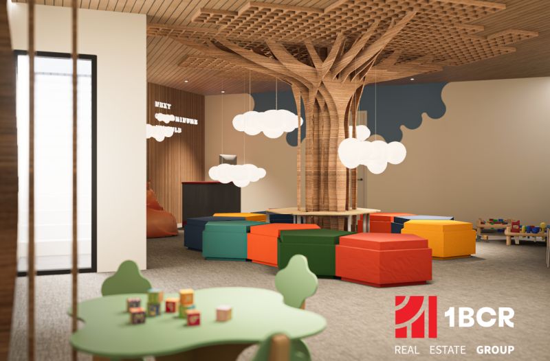 Colorful children's playground with a wooden tree and play blocks, apartment construction.