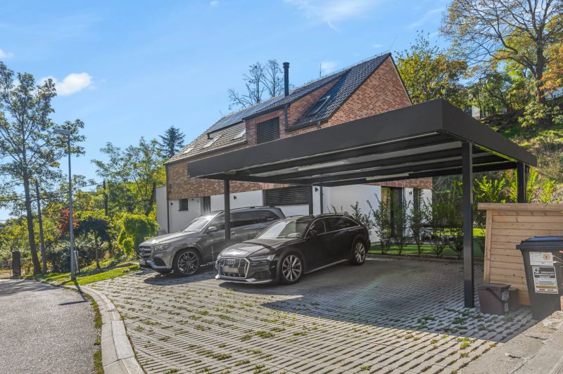 A family house in Vtáčie údolie in Bratislava - Koliba with a carport.
