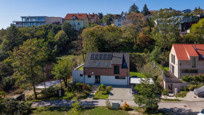 A family house in Vtáčie údolie in Bratislava - Koliba surrounded by greenery.