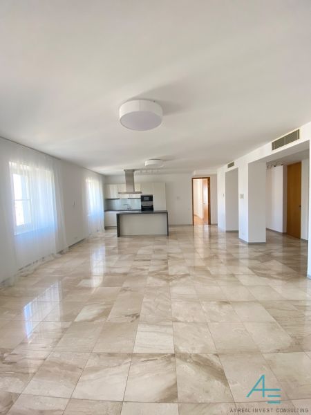 A bright space of a 3-room apartment on Hlboká Street with tiles and a modern kitchen.