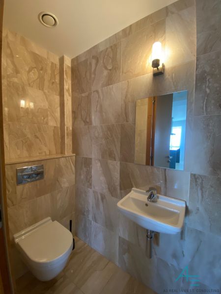 Bathroom on Hlboká Street with a toilet and sink in a 3-room apartment.