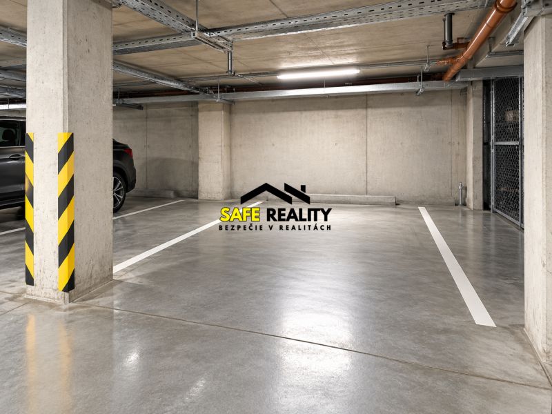 Underground parking space in garages with signaling stripes and concrete walls.