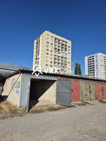 Garages on Jantárová Street in Košice, Juh district, in front of the apartment buildings.