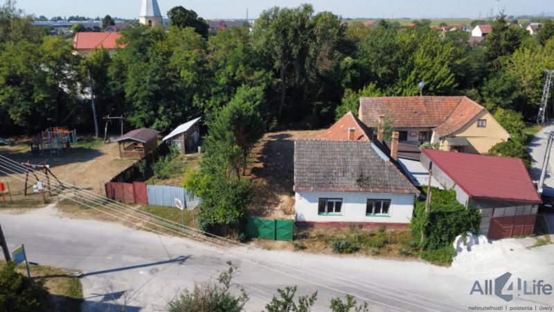 Family house on St. Florian Square in Krakovany with a yard and a children's playground.