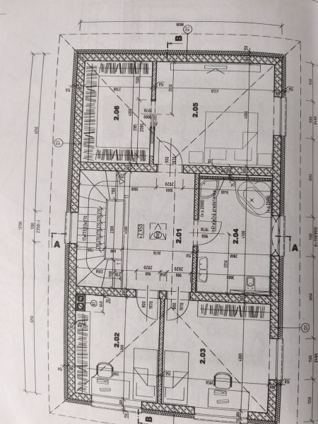 Floor plan of a family house in Zlaté Moravce with three bedrooms and a bathroom.