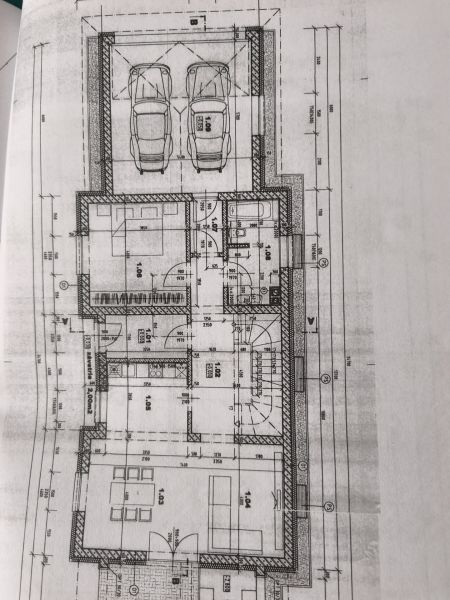 Floor plan of a family house in Zlaté Moravce with a double garage and multiple rooms.
