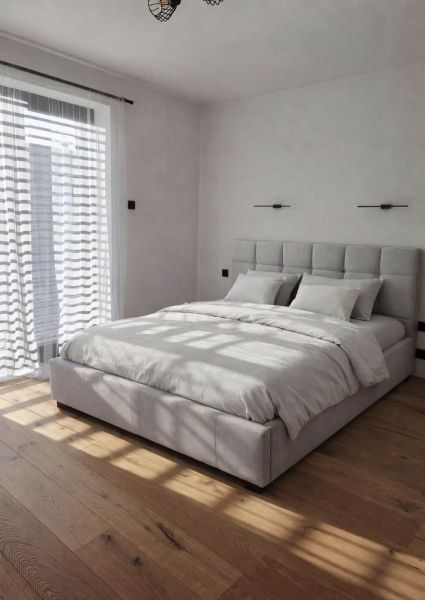 Bedroom in a family house with a large bed, curtains, and a floor with a wooden decor.