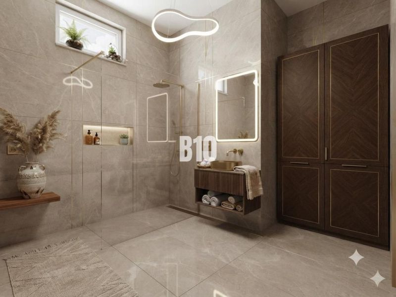 A bathroom in a family house with large cabinets and a mirror.