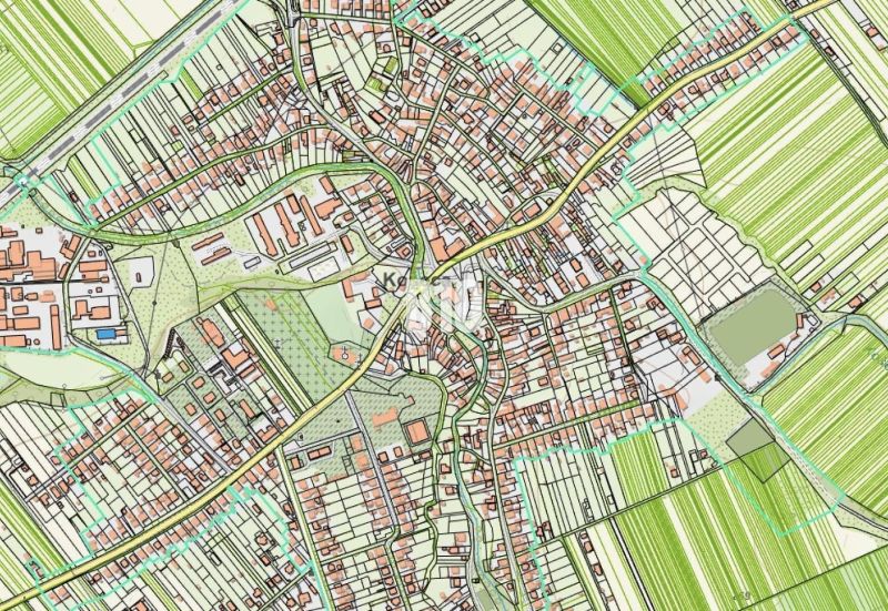 The map of the village Košeca shows the layout of streets, buildings, and adjacent fields.