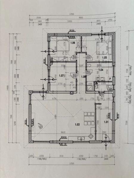 Ground floor plan of a family house with kitchen, living room, and bedroom areas.