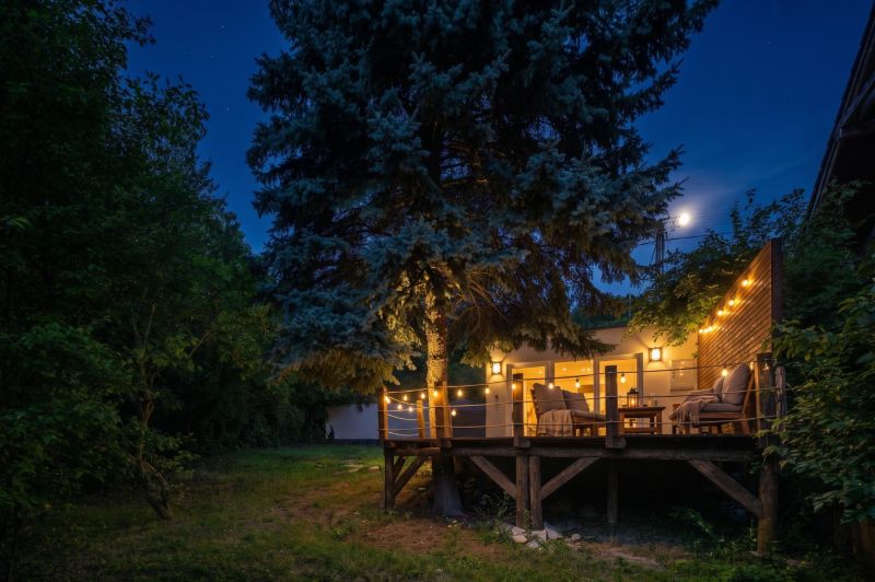 Evening lighting on the terrace among the trees, Recreational plots, Bratislava - Devín, Devínska cesta.