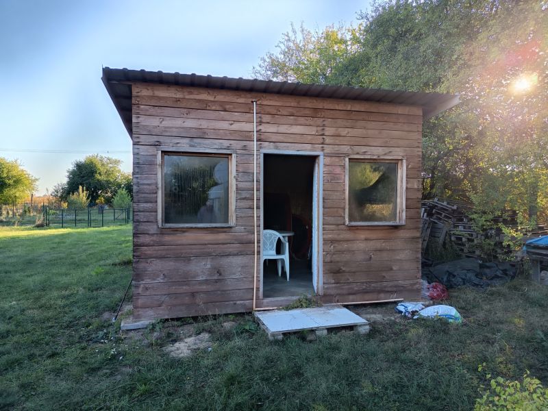 A wooden cottage with a garden on Tatranská Street in Zlaté Moravce during a sunny day.