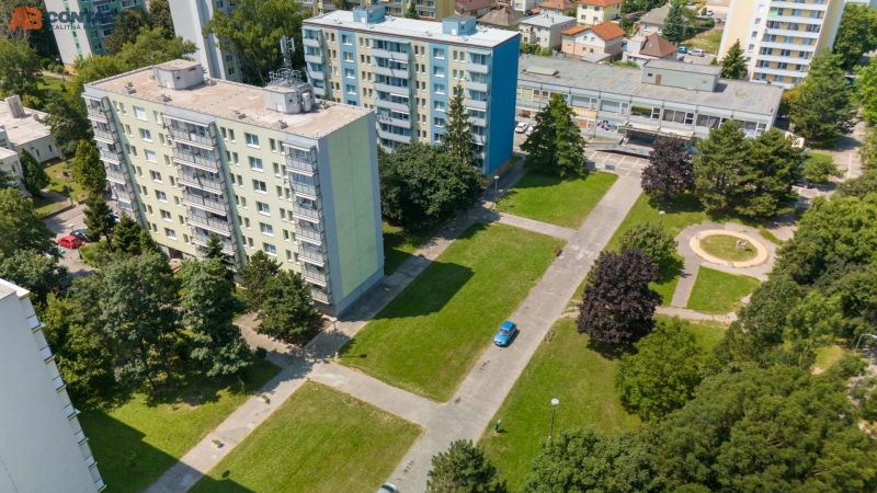Apartment blocks and greenery on 8th May Street in Piešťany.