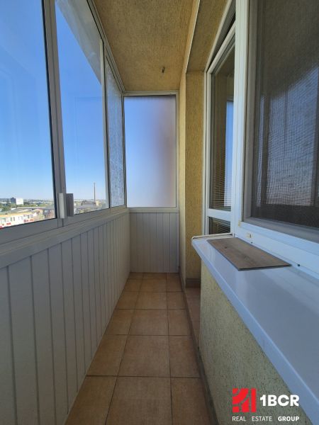 A balcony in a studio apartment with a view of Bystrická Street in Pezinok.