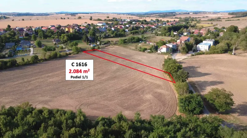 Agricultural and forest land in the village of Podhájska, with an area of 2,084 m².
