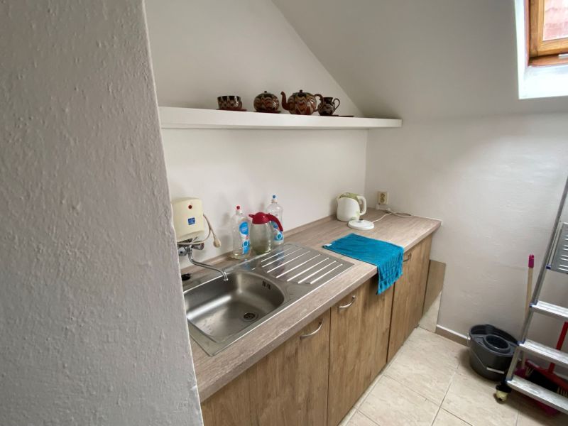 Kitchen unit with a stainless steel sink and a shelf for dishes, Offices.