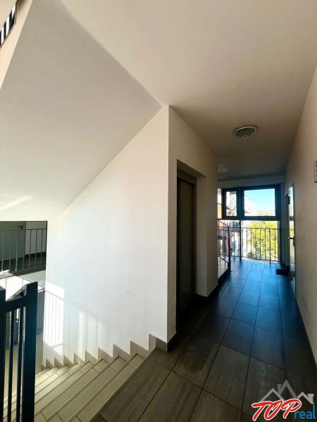 A staircase with a view of the surroundings in a 3-room apartment on Obrody Street, Košice - Západ district.