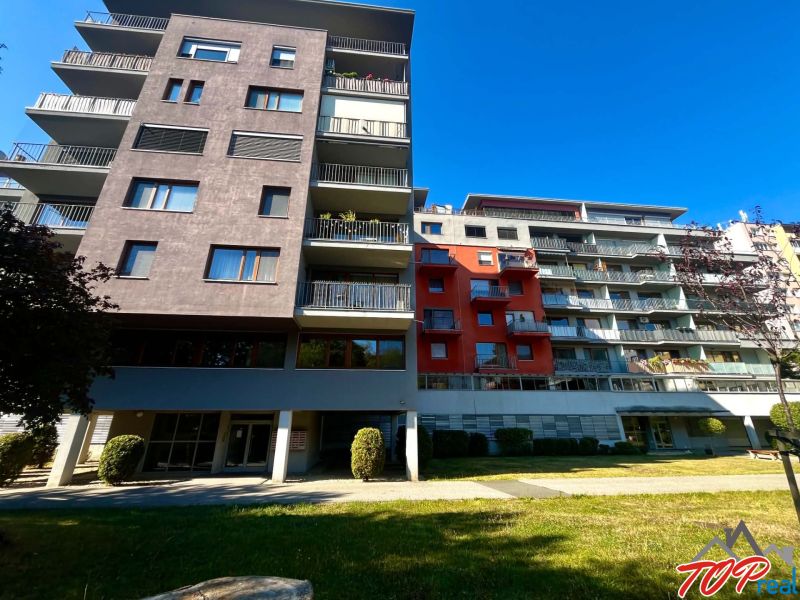 Apartment building on Obrody Street in Košice - Západ district, with balconies and greenery.