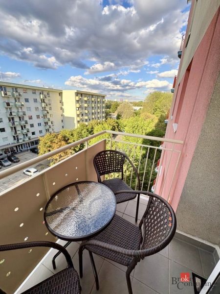 A balcony in a 3-room apartment on Šustekova Street in Bratislava-Petržalka with a view of greenery.