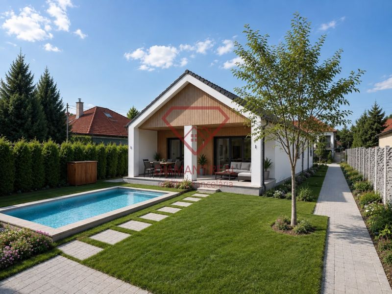 A garden at a family house with a swimming pool on a street in Veľká Mača under a blue sky.