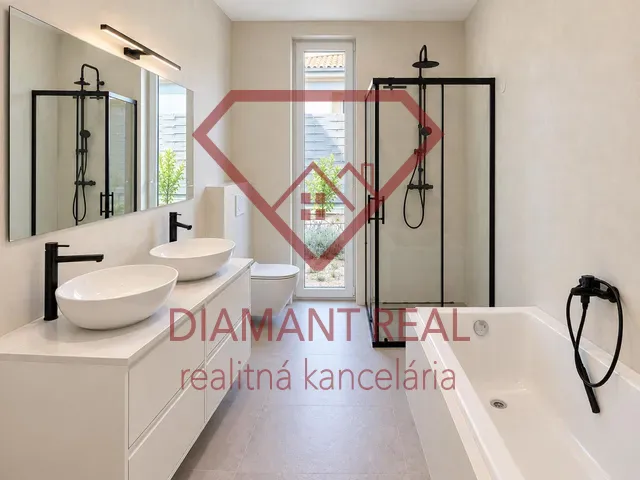 A bathroom with two sinks, a shower, and a bathtub in a family house.