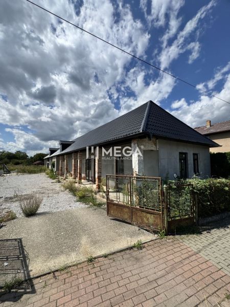 A family house in Nacina Ves with a modern roof and an open extensive plot.