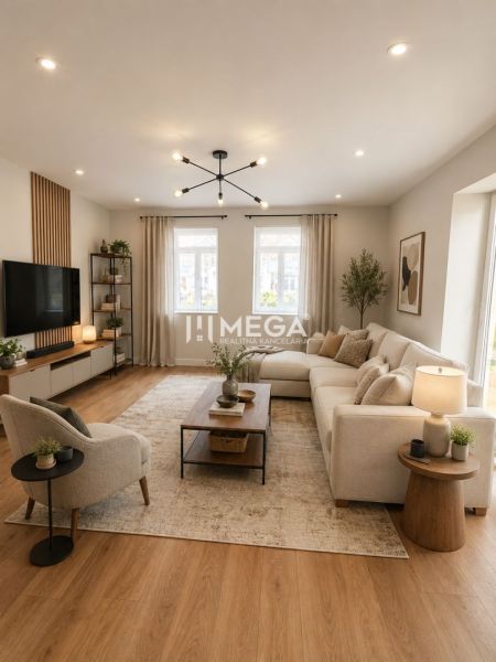 Living room in a family house with a large sofa and a wooden decor floor.