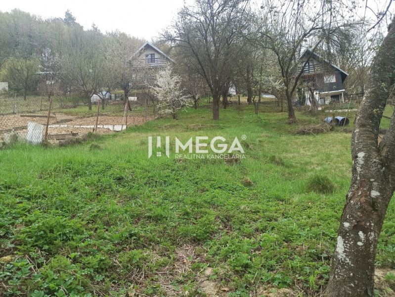 Gardens in Humenné with cottages and trees, suitable for cultivation and relaxation.