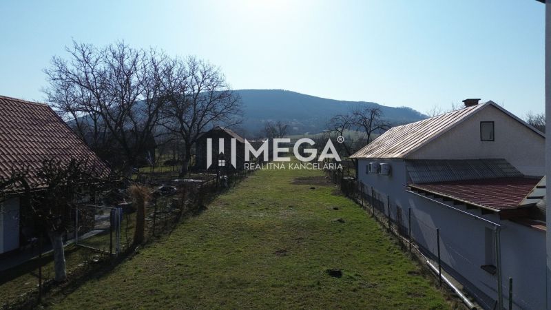 A view from Ptičie to Ptičie - residential plots with a view of the hills.