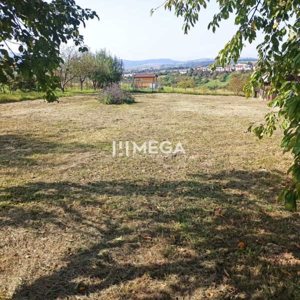 A residential plot in Humenné offers a natural environment and views of the surrounding hills.