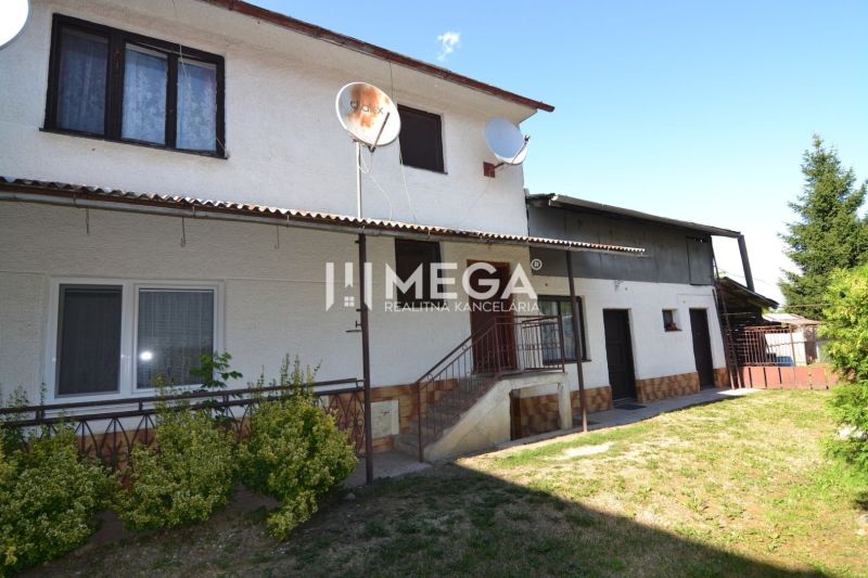 A family house in Hažín nad Cirochou with a yard and a white facade on Hažín nad Cirochou street.