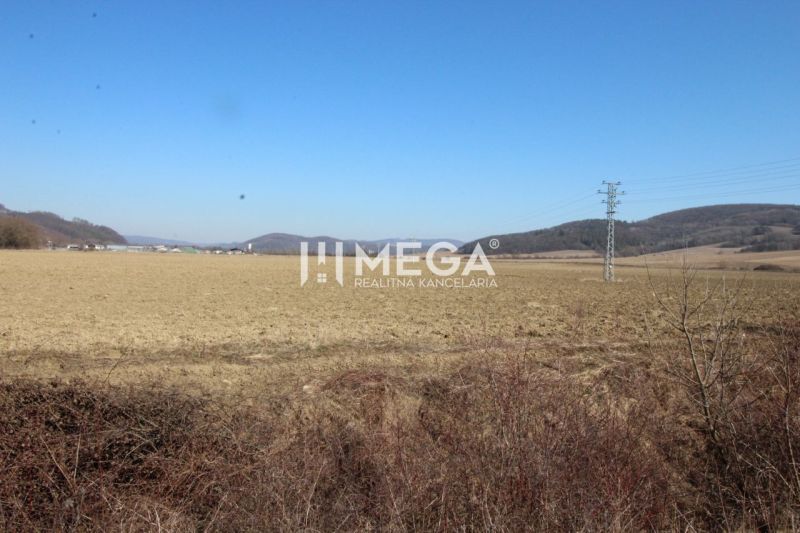 Agricultural and forest land in Lackovce, Lackovce with a view of the surrounding nature and hills.