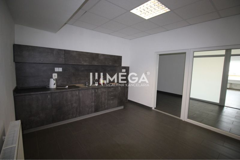 Offices with a kitchenette, ceramic tiles, and glass doors.