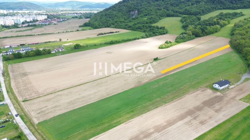 Aerial view of agricultural and forest land near Dlhá Street in Jasenov.