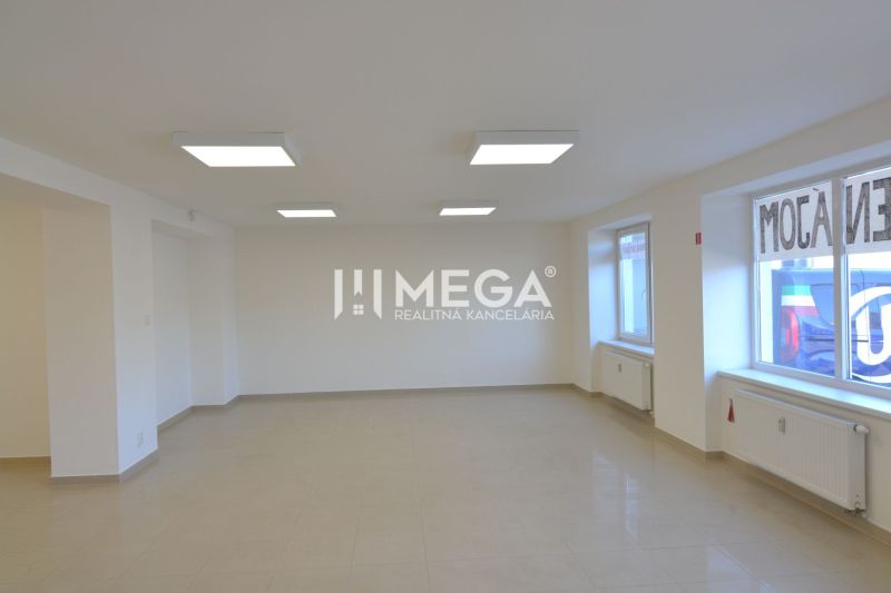 Bright commercial spaces with large windows, tiles, and artificial lighting.